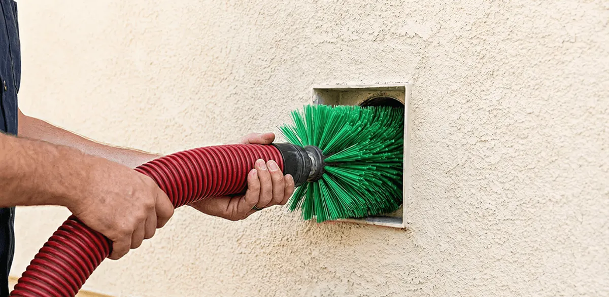 Air duct cleaning brush removing debris from a vent opening in Riverside, CA