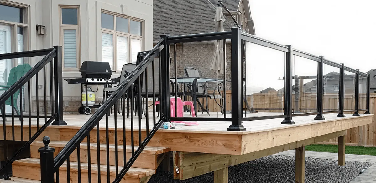 Handrail installation on a deck staircase for safety and code compliance in Riverside, CA