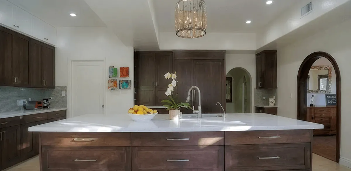 Cabinet refacing project with updated kitchen cabinets and island in Riverside, CA
